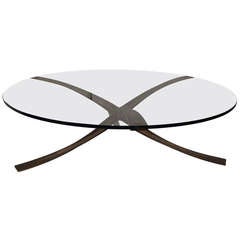 A Round Coffee Table In Bronze With Glas Tabletop By Michel Mangematin
