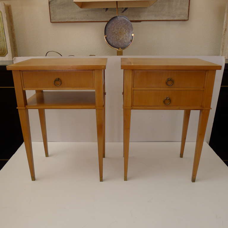 a pair of side tables in fruitwood with bronze details.