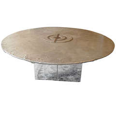 Round Cast Steel Coffee Table with a Chromed Metal Base