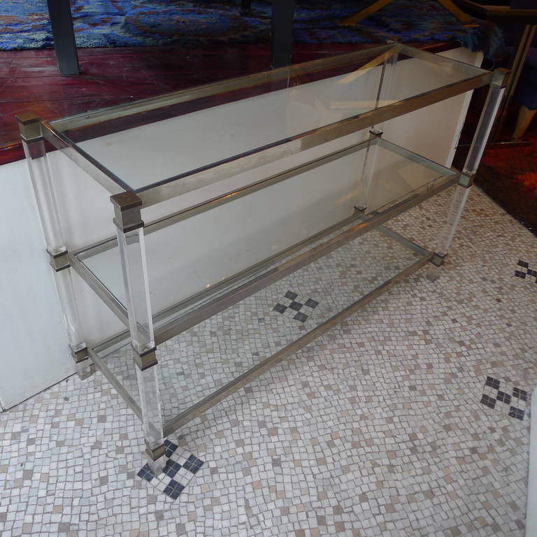 A three tier Romeo Rega console table in plexiglas with patined bronze and nickeled metal details.