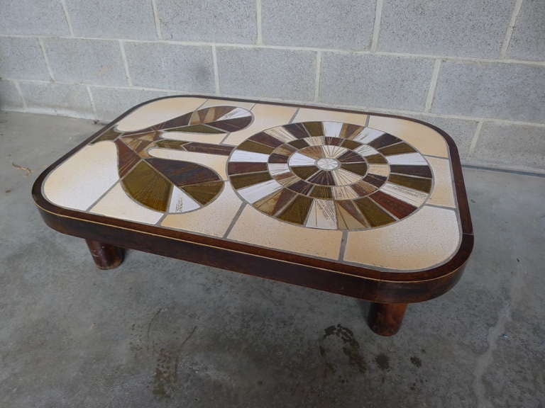 Rectangular coffee table with rounded edges signed Capron
Valauris France.