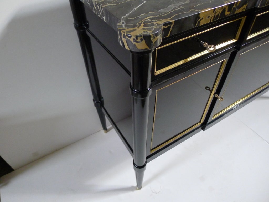 A Fine Jansen Armoire with Portor Marble Tabletop