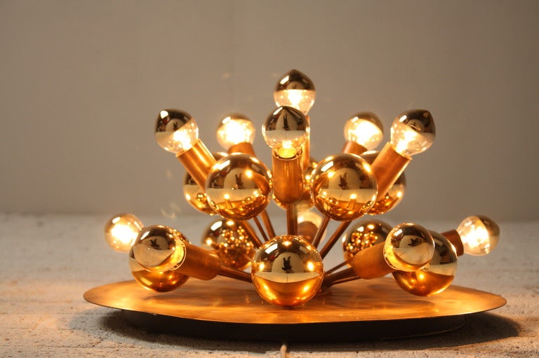 SPUTNIK COSACK COPPER. Vintage Sputnik lamps from '70s. Twelve copper bulbs and ten plastic bulbs makes this lamp. The lamp is also of copper. The lamp can be used as a ceiling lamp, and as a wall lamp. All the lamps are market with a sticker of