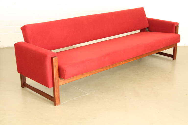 Large 220cm couch. Designed by Braakman for Pastoe. The couch can be turned into a sleeping couch. Teakwood.