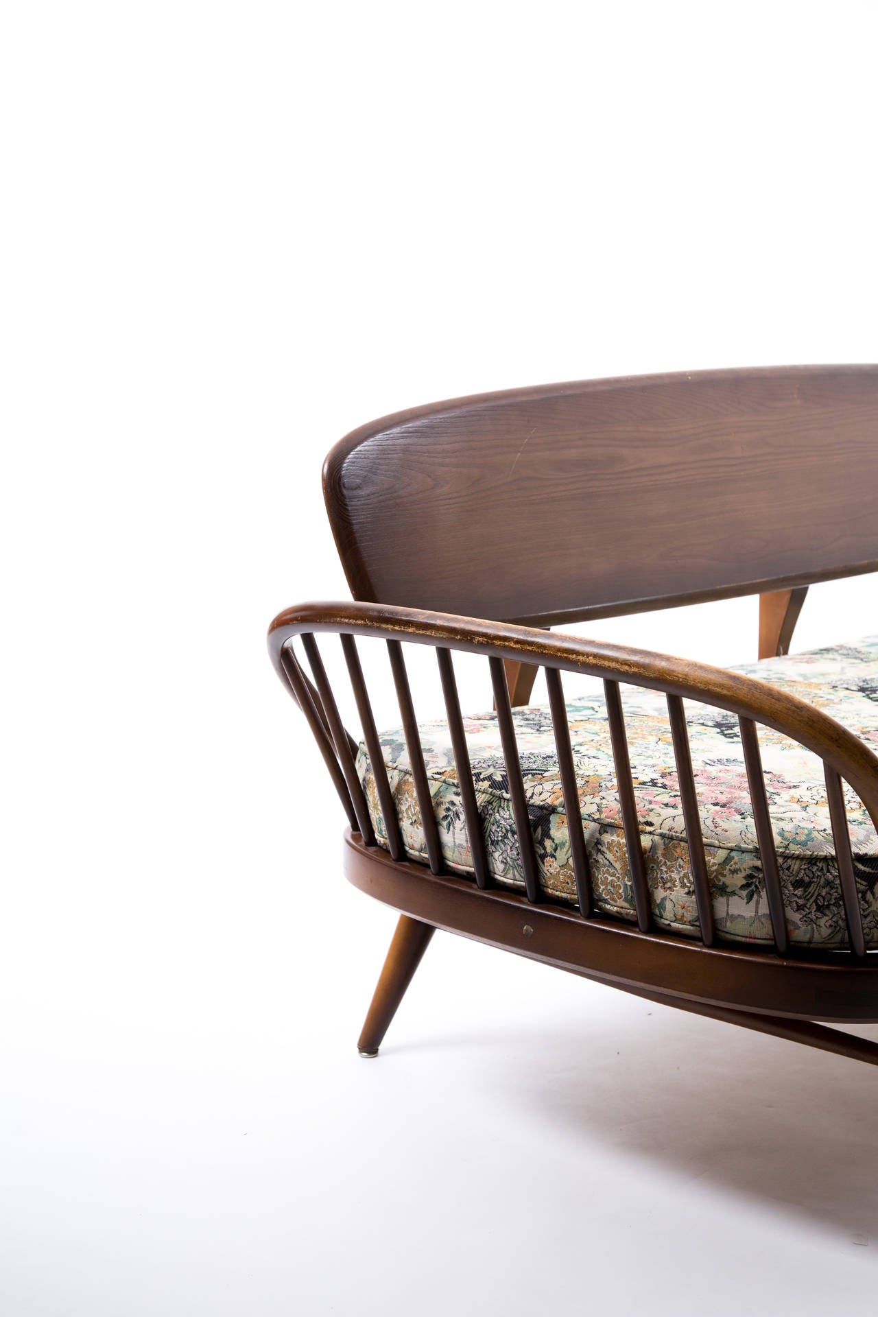English Ercol sofa plus footstool with romantic embroidery