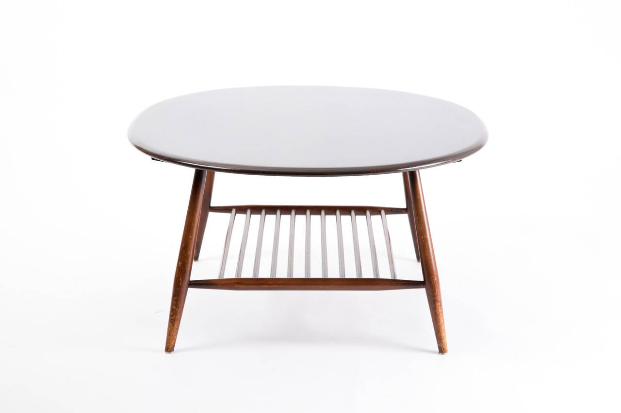 Mid-Century Modern Ercol england oval table with magazin layer