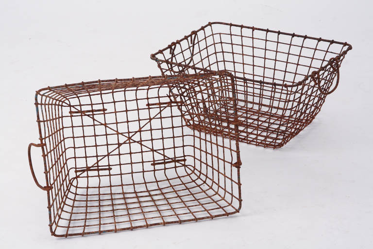 French oyster baskets. A set of two oyster baskets. They are used in the oyster production in the sea and now very decorative. Super metal patina.