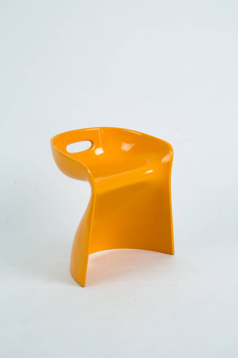 Winifred Staeb chair. Color orange. Pressed polyurethane. Organic form. A chair as a sculpture.