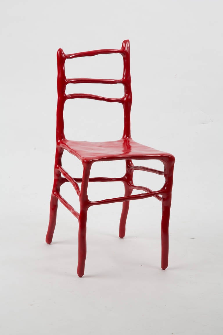 Maarten Baas made this clay chair at the artfair Art Basel in 2007. This chair is one of five red clay chairs numbered 3/5. He is now one of the most famous Dutch designers. Signed by maarten baas with marker. Naam BAAS in metal and year as a mark