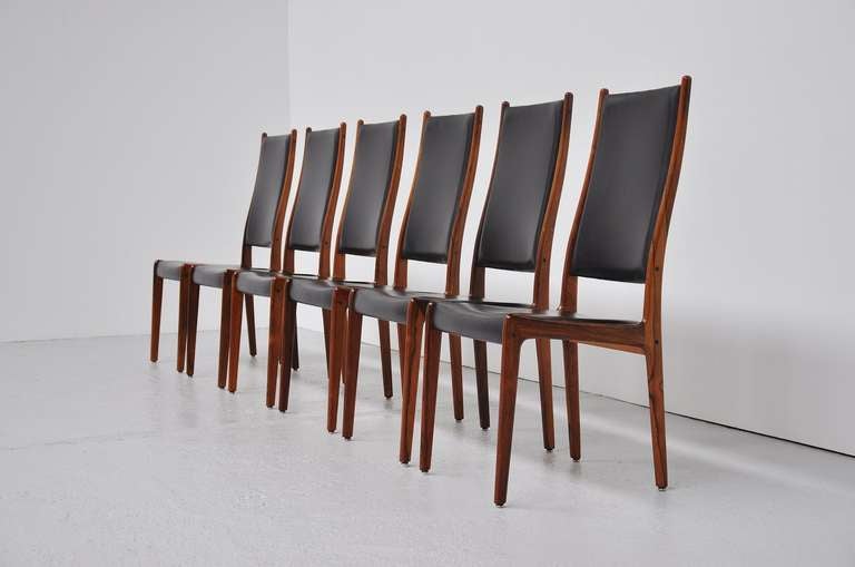 Fantastic high back dining chairs by Johannes Andersen. Great dovetail connections to the solid rosewood frames.

Please contact us for affordable global shipping quotes, we ship from $50 for small items up to $500 - $ 1,000 for larger items. We