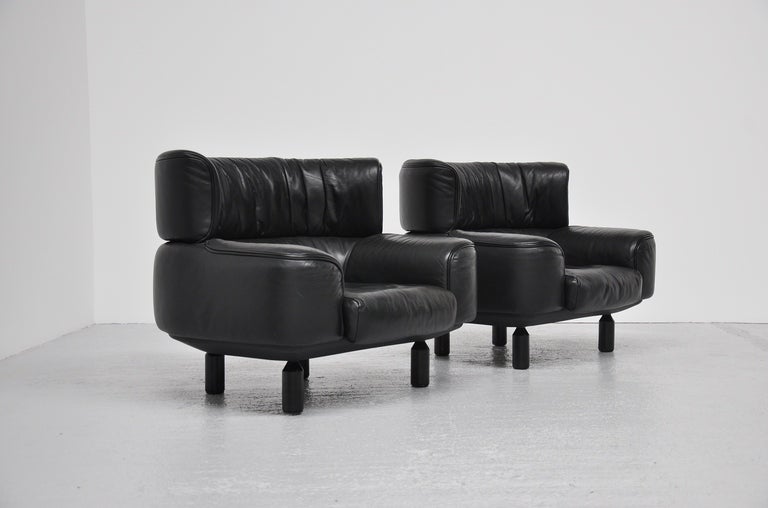 Amazing looking pair of club chairs designed by Gianfranco Frattini for Cassina 1987. These chairs are no longer in production and only produced for 1 year. I cannot find any reference on these chairs on the interenet but they are documented in the
