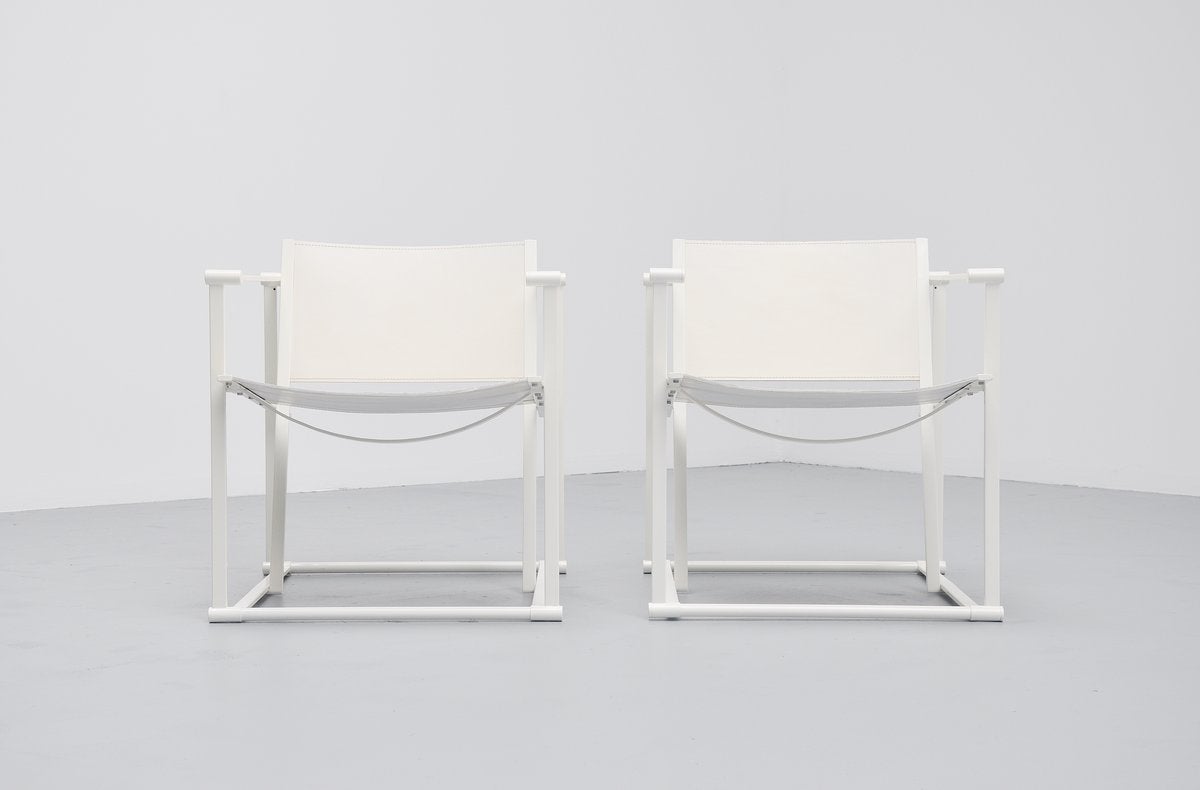Very nice pair of cubic chairs designed by Radboud Van Beekum for Pastoe, Holland, 1980. These chairs are very hard to find in white, normally you only see them in black. In very nice condition with very thick white saddle leather. Good condition,
