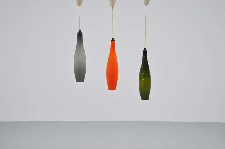 Fantastic pendant lamp set with very nice typical Danish colors. Hard to find set of 3, great above your dining table.