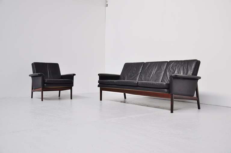 Fantastic sofa set by Finn Juhl for France & Son, Denmark 1965. This fantastic superb quality sofa is nice because of its simplicity. Premium leather sofa and high quality rosewood leggs. The chair has a tilt back, super comfort and super shape.