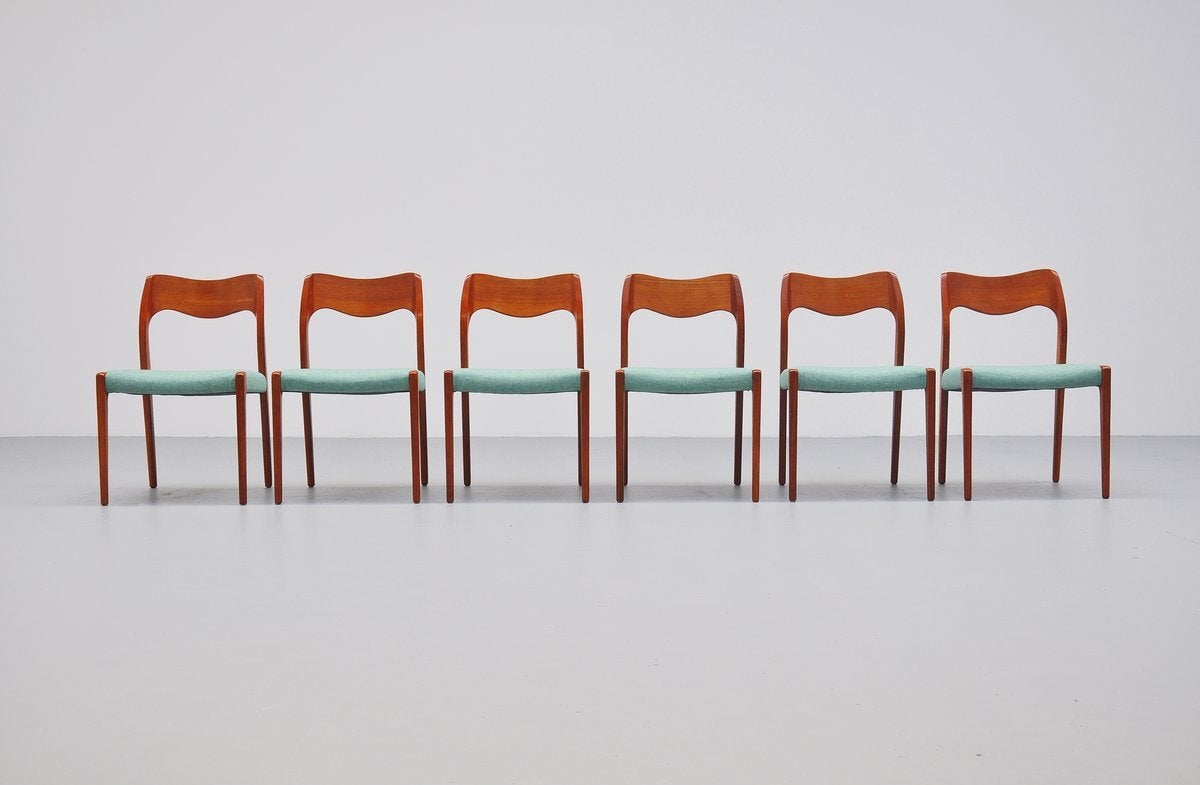 Quality dining chairs in teak, model 71 designed by Niels Møller for J.L. Møller Mobelfabrik, Denmark, 1951. These chairs are made of solid teak and they are newly upholstered in Camira from advantage. The nice mint green color fabric is a nice