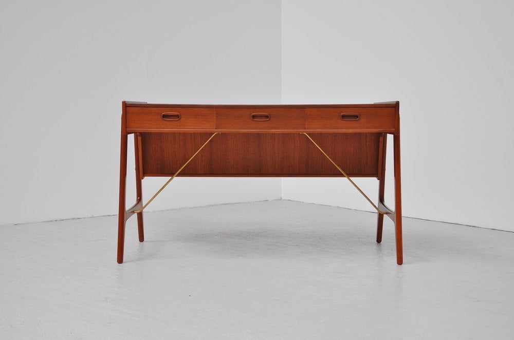 Mid-20th Century Danish teak orrganic desk with brass details