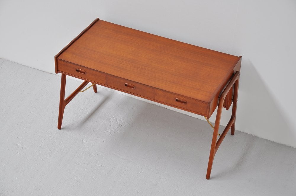 Danish teak orrganic desk with brass details 3