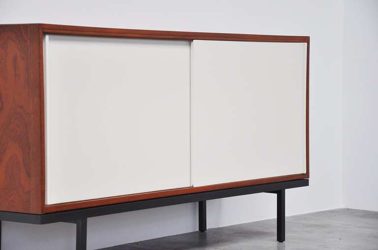 
Rare small sideboard designed by Martin Visser (1922-2009) for â??t Spectrum in 1958. This small sideboard, type KW61 also called 'Overloon' and was the 1st model from these series, designed by Martin Visser and Jos Manders. This was only produced