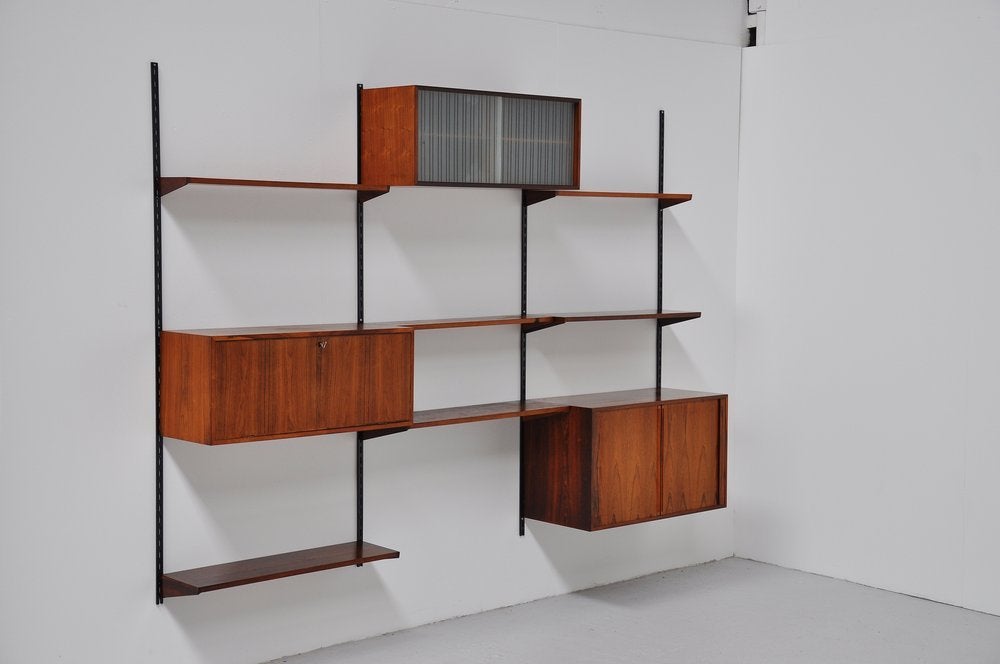 Fantastic Danish wall system designed by Kai Kristiansen for FM Mobler, Denmark 1960. This is a very nice and complete unit in very good condition. Can be adjusted by own tast and style.