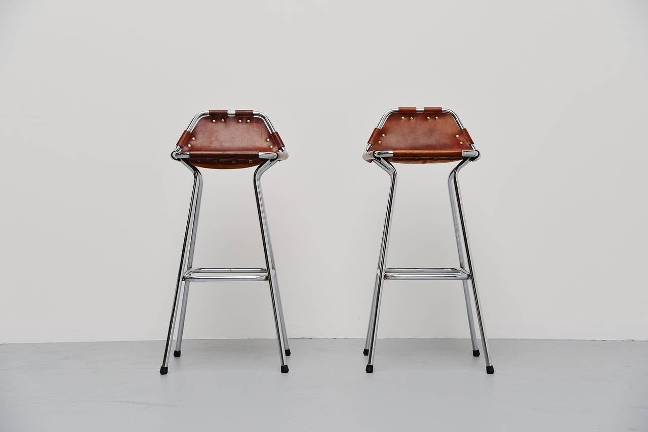 Very nice set of bar stools attributed to Charlotte Perriand. These are very similar to the know stools by Perriand but the shape is slightly different. The seats look quite the same to me so maybe these are early stools, prototype, pre productions?