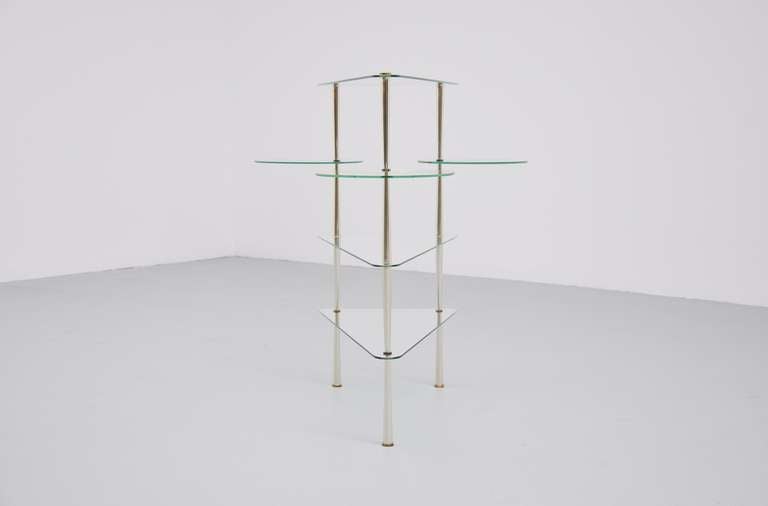Very nice an funny table console table, can be used as coffee table as well. And you can change the height cause its fully dismountable. Very nice old glass and gold looking aluminum feet with brass ends.