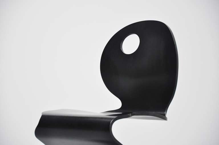 Famous plywood side chair by Verner Panton in black lacquered plywood. This was designed by Panton for Studio Hag, Denmark 1992. Very nice chair in black, easy to combine in any interior. Very good and original condition.