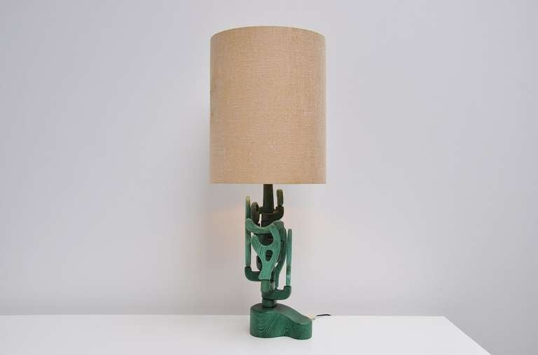 Fantastic large brutalist table lamp with organic shaped green ebonized wooden base and a very nice original long fabric shade. The lamp has a spectacular size and the abstract cactus shaped base is something I have never seen before. A real beauty