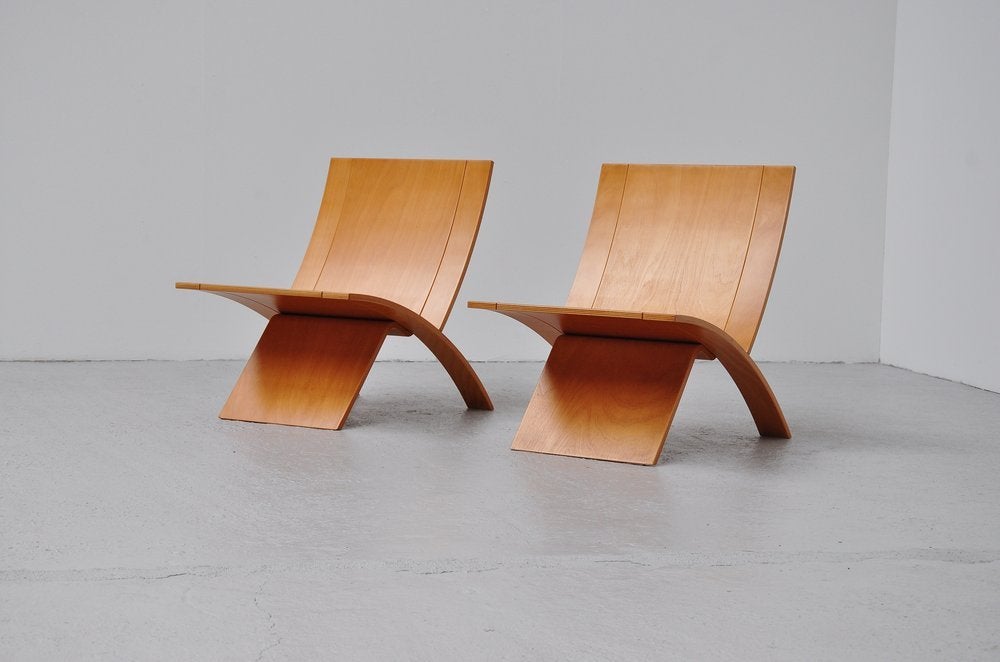 Beautiful pair of lounge chairs designed by Jens Nielsen for Westnofa, Norway 1966. This amazing slim design was made of high qality plywood and looks in amazing condition. The chairs excist in 2 pieces so they are easy to store and ship.
