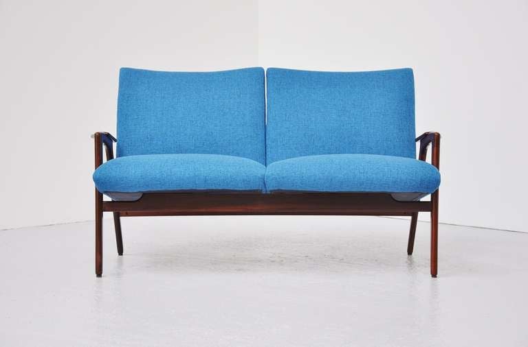 Very nice small loveseat or two seater sofa designed by Yngve Ekstrom for Pastoe, Holland 1960. This sofa is documented in several Pastoe catalogues. This sofa was reupholstered and has new foam so this looks fantastic again. Comfort seating and
