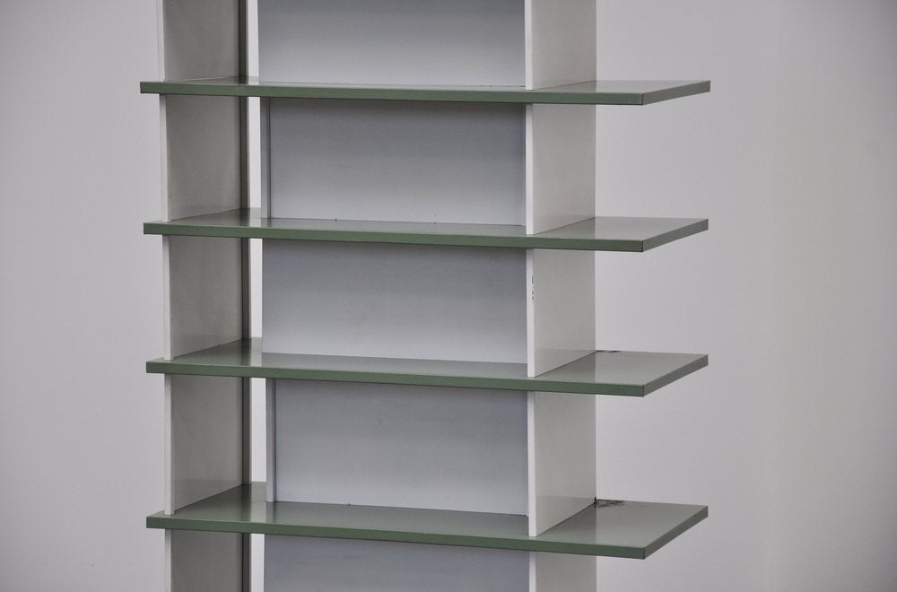 Very impressive bookcase / room divider designed by Industrial designer Wim Rietveld, son of Gerrit Rietveld. This bookcase was a big question, but it was made for exclusive department store De Bijenkorf in 1960. De Bijenkorf sold a lot of top