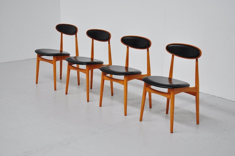 Norwegian dining chairs set of 4 in beech and black vynil at 1stdibs