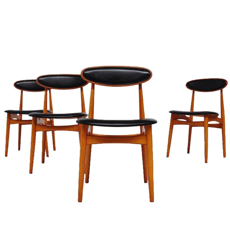 Norwegian dining chairs set of 4 in beech and black vynil at 1stdibs