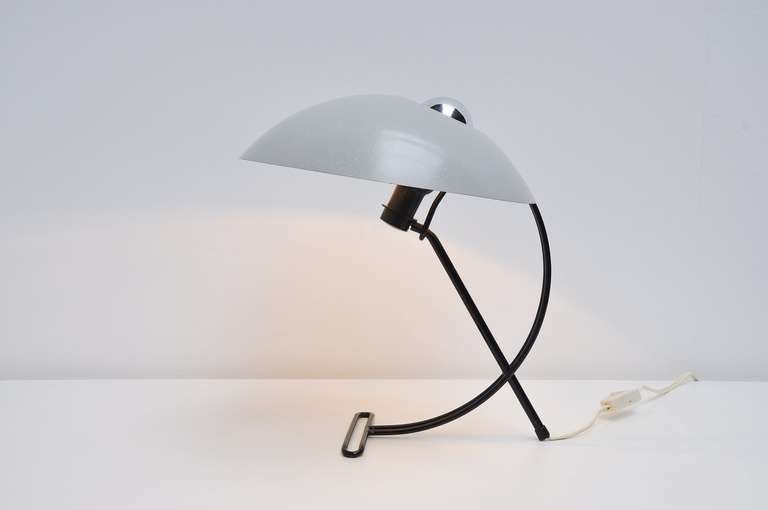 One of the most beautiful desk lamps designed by Louis Christiaan Kalff for Philips, Holland, 1957. This is model NB100, This has a black wire frame with a grey dot lacquered shade. Gives very nice light when lit with the half mirrored bulb