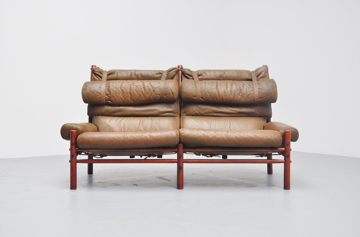 Very nice example of the Inca sofa designed by Arne Norell for Norell, Sweden 1965. This comfortable 2 seater sofa is in outstanding original condition with very nice patined olive green buffalo leather seat. The frame is made of solid teak and