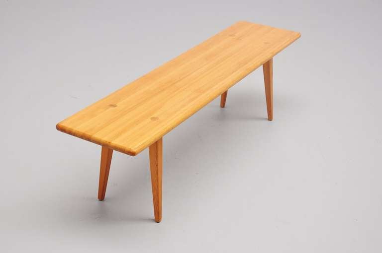 Nice and simple bench in solid pine wood designed by Carl Malmsten for Svensk Fur, Sweden 1940. This early designed bench as made of fixed pine slats and have a look at the very nice detailed connection of the leggs. Rare piece of Scandinavian