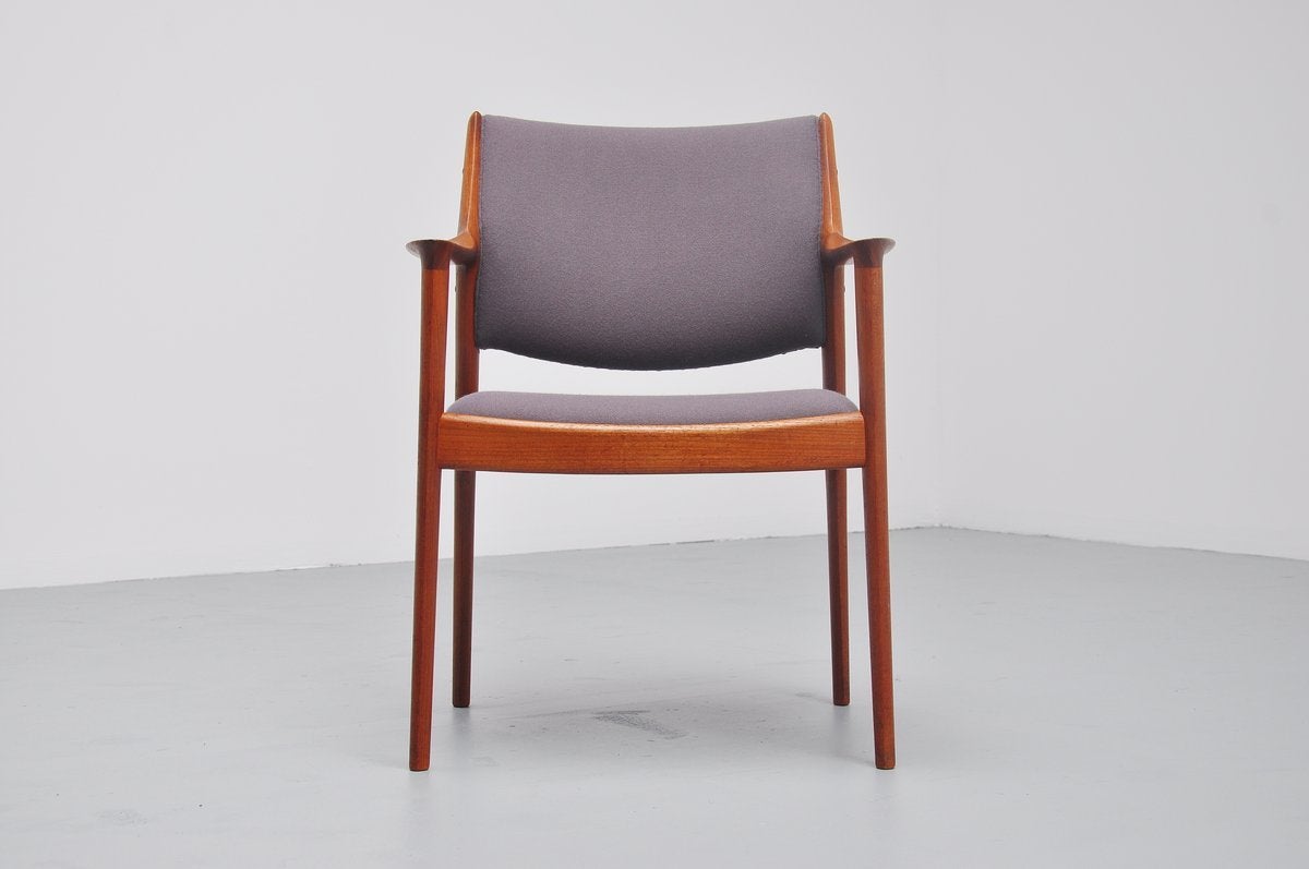Very nice armchair designed by Torbjørn Afdal for Nesjestranda, Norway, 1960. This chair was made of solid teak and has new grey Tonus upholstery by Kvadrat, upholstered like it originally was. One armrest has a professional repair as can be seen on