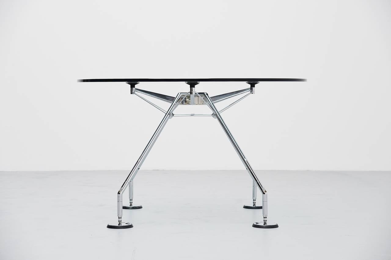 Instant classic is this table designed by Sir Norman Foster for Tecno, Italy 1987. This table is from the Nomos series which Foster designed for his own office in London. But this table became a worldwide success. This table looks amazing with high