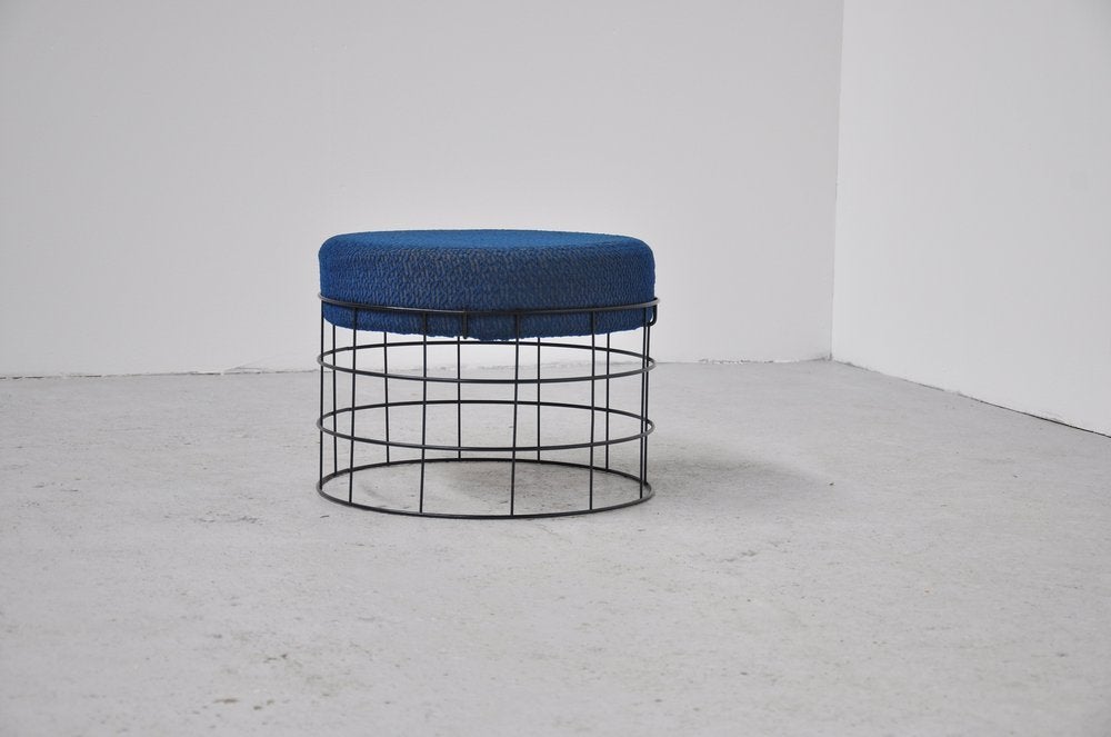 Early stool by Verner Panton for J Luber, Denmark 1955. This black wire frame has a fantastic blue fabric seat which is still original, I did not find this as original Panton fabric but it could be cause Panton designed a hundreds of fabrics. This
