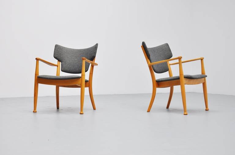 Fantastic pair of easy chairs designed by Peter Hvidt (Designer) and Orla Molgaar Nielsen (Architect and Designer) for Portex, Denmark 1944. This chair was originally designed as stacking armchair for dining table, and was about the 1st stacking