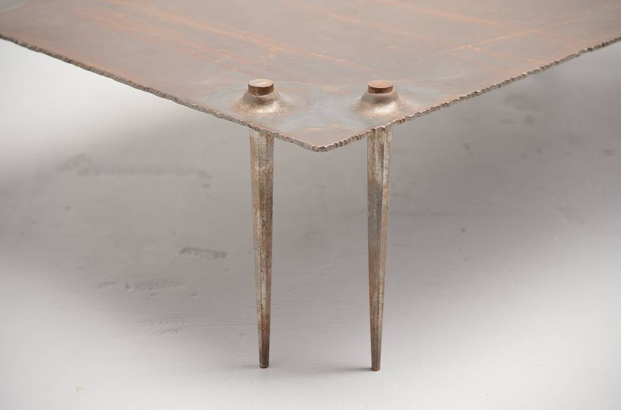 Fantastic shaped Brutalist coffee table by Idir Mecibah (1958-2013), produced by Smederij Moerman, 1998. This table is from the scrab series designed in the end of the 1980s and produced till the end of the 1990s. The table is made of solid steel