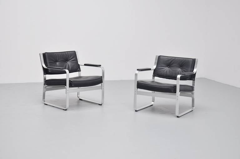 Nice and comfortable pair of lounge chairs designed by Karl Erik Ekselius for J.O.Carlsson, Sweden 1965. These chairs are made of brushed aluminum and have newly upholstered black leather seats, this was upholstered with premium quality Hulshoff