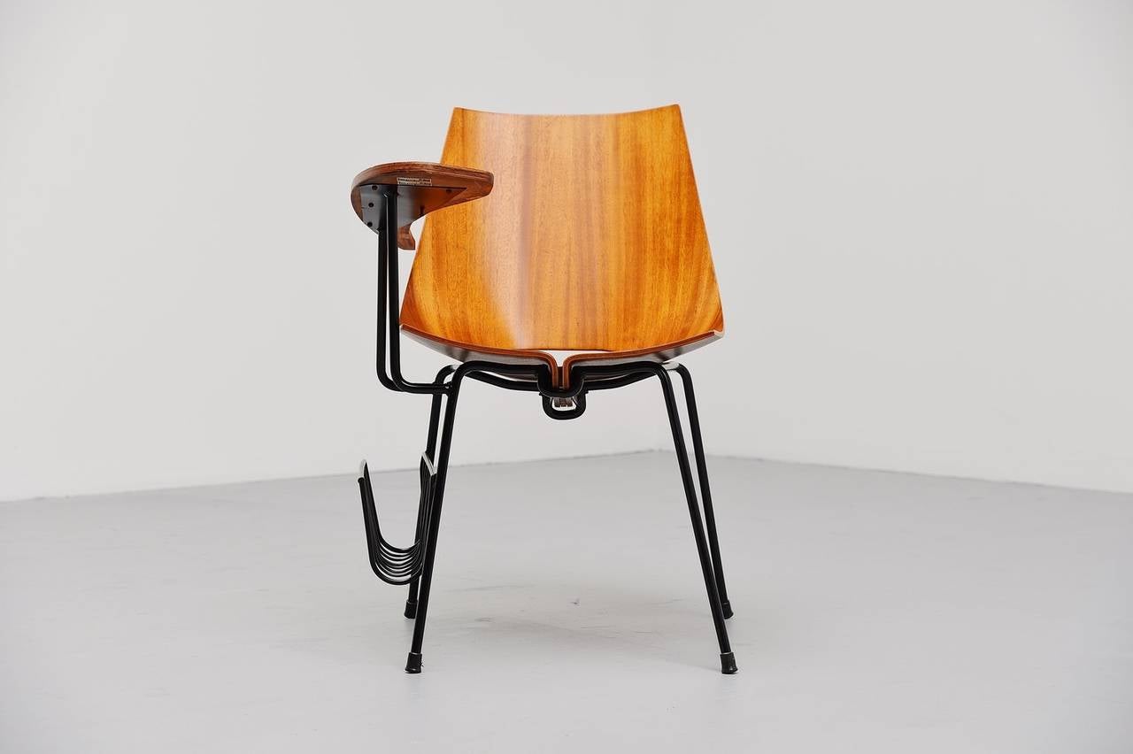 Very nice side chair attributed to Vittorio Nobili, Italy, 1950. This table has an attached armrest/table and magazine rack. Very nice and unusual shaped side chair typical Italian shaped. Very nice plywood seat and solid metal black lacquered