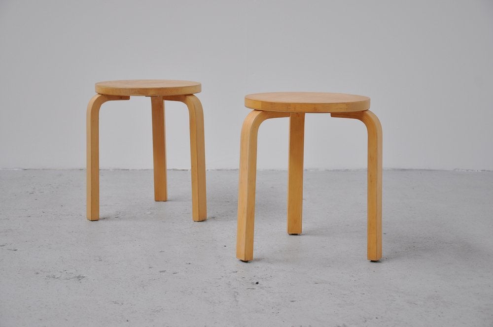 Very nice pair of stools designed by Alvar Aalto for Finmar, Finland 1933. These stools are made by Artek, Finland 1960. These stools are not from the first production but made by Artek. Stools are made of beech plywood and in nice vintage
