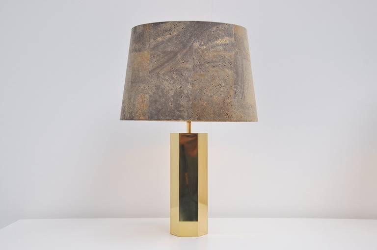 Two very nice and rare table lamps designed by Ingo Maurer for Maurer, Germany, 1962. These lamps have a hexagonal base in brass and a very nice original Maurer cork shade which is often broken or damaged. These lamps are in an amazing condition and