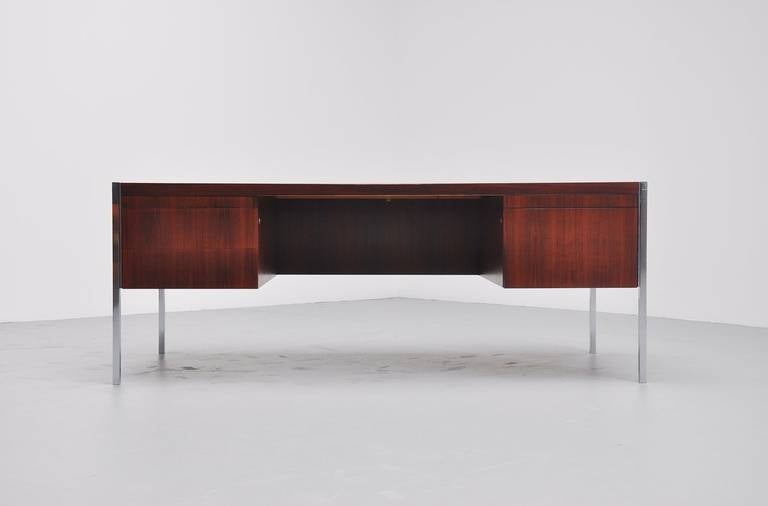 Fantastic executive desk designed by Richard Schultz for Knoll International, USA, 1963. This superb quality desk was made up super quality materials and therefore weighs a lot. The desk has solid brushed steel legs and is made of rosewood. The wood