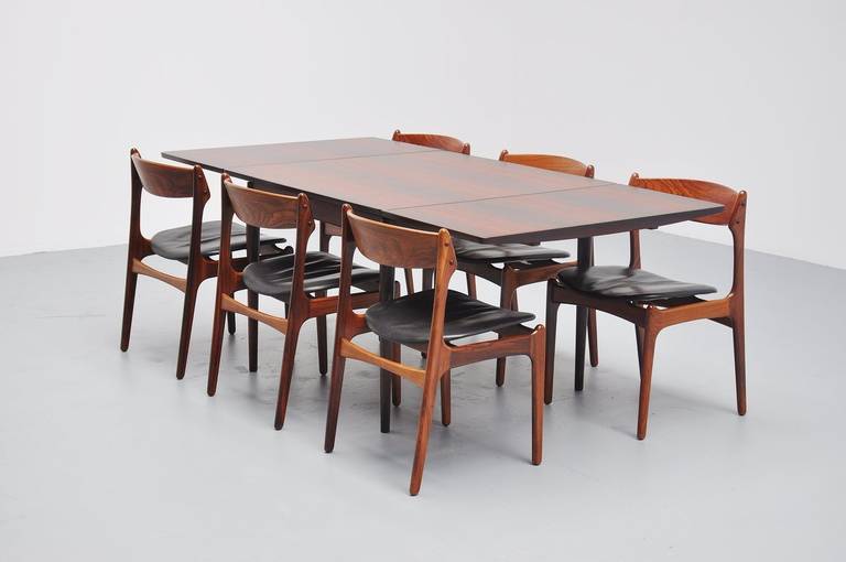 Very nice small dining table Model #220 designed by Arne Vodder for Sibast mobler, Denmark 1960. This is for a very nice subtle sized table in very nice grained rosewood. The table has 2 extension leaves and can turn from a 4 persons table into a 6