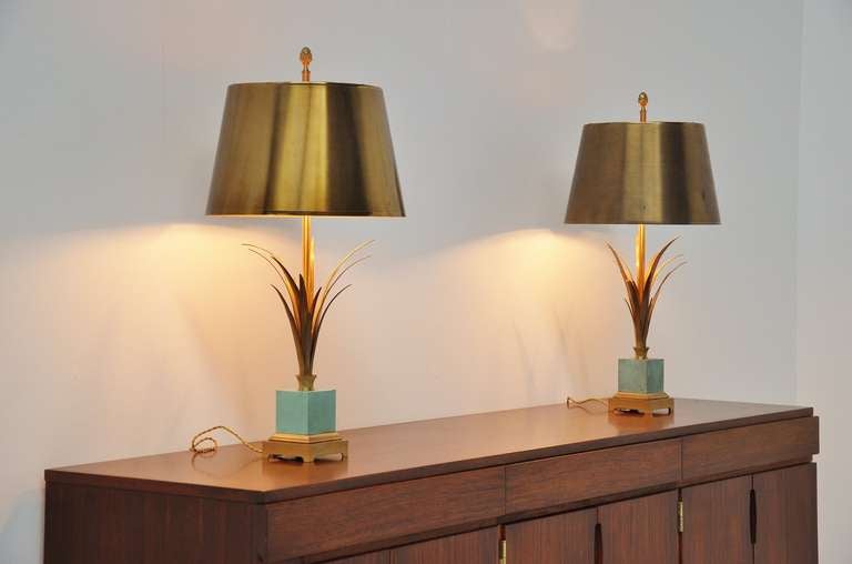 Fantastic pair of table lamps with original brass shades, bronze patined base, very heavy quality. Stamped on the bottom 'Charles Made in France'. Nice green bronze cubes, fantastic pair hard to find in this condition.