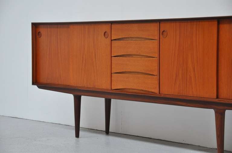 Amazing finished sideboard, made in Denmark unknown designer. Quality looking all over, still in fantastic condition, restored top with UV protection lacquer.