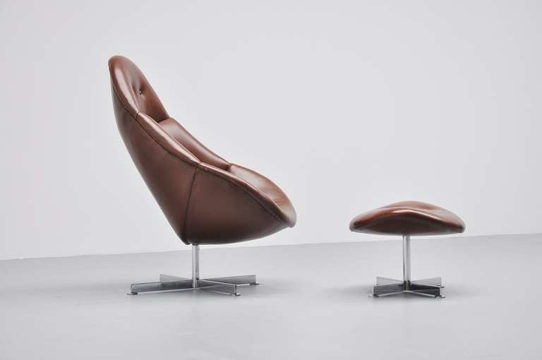 Mid-Century Modern Brown leather lounge chair with footstool 1970