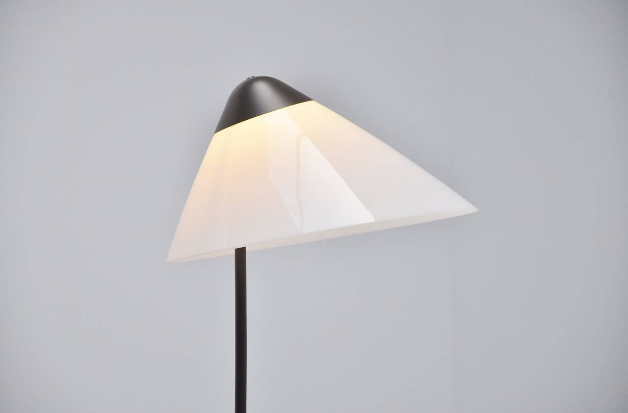 Amazing floor lamp designed by Hans Wegner, this lamp is back in production but with a revised foot. This is the original model from 1975, Denmark.

Please contact us for affordable global shipping quotes, we ship from $50 for small items up to